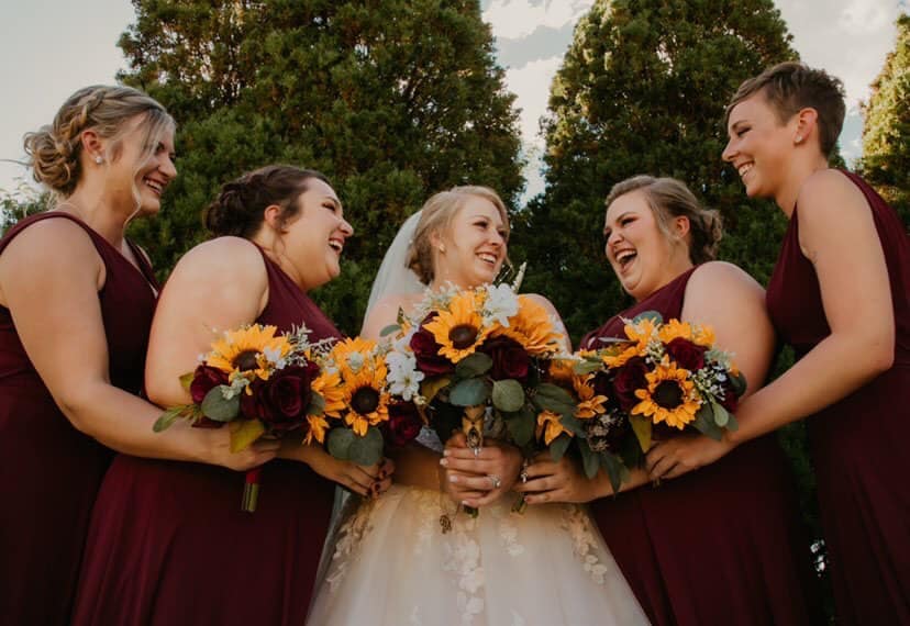 Sunflowers and Roses bridal party bouquets